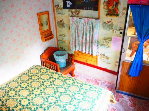 Imagen de la habitación del Hotel Three J Guesthouse. Foto 15