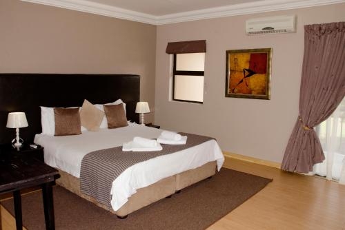 Imagen de la habitación del Hotel Three Oaks And An Aloe Boutique. Foto 8