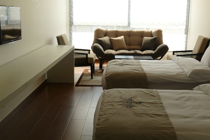 Imagen de la habitación del Hotel Three Onine Urban House. Foto 7