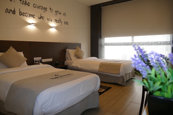 Imagen de la habitación del Hotel Three Onine Urban House. Foto 12