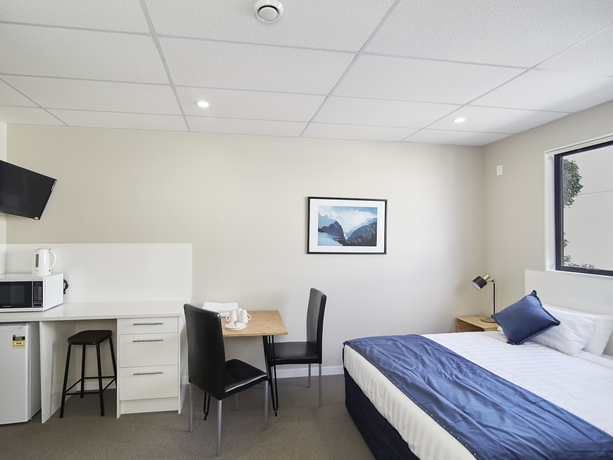 Imagen de la habitación del Hotel Three Palms Lodge. Foto 4