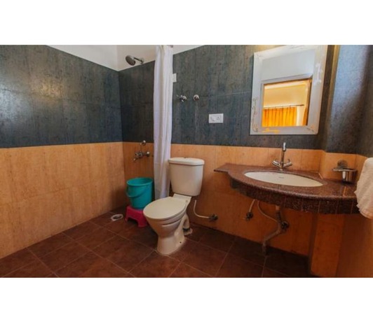 Imagen de la habitación del Hotel Three Roses. Foto 9