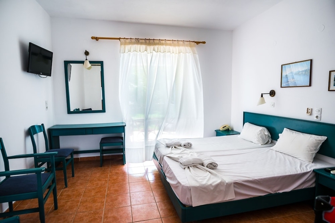 Imagen de la habitación del Hotel Three Stars Beach. Foto 11