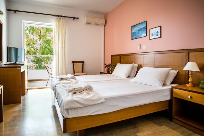 Imagen de la habitación del Hotel Three Stars Beach. Foto 12