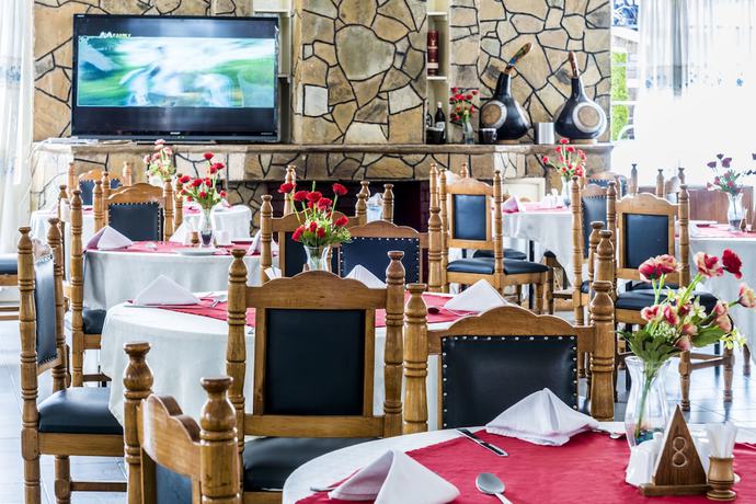 Imagen del bar/restaurante del Hotel Three Steers. Foto 5