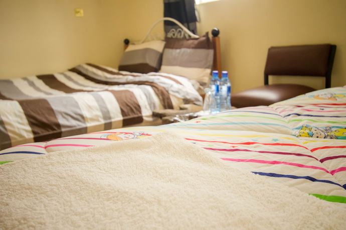 Imagen de la habitación del Hotel Three Ways and Restaurant. Foto 9