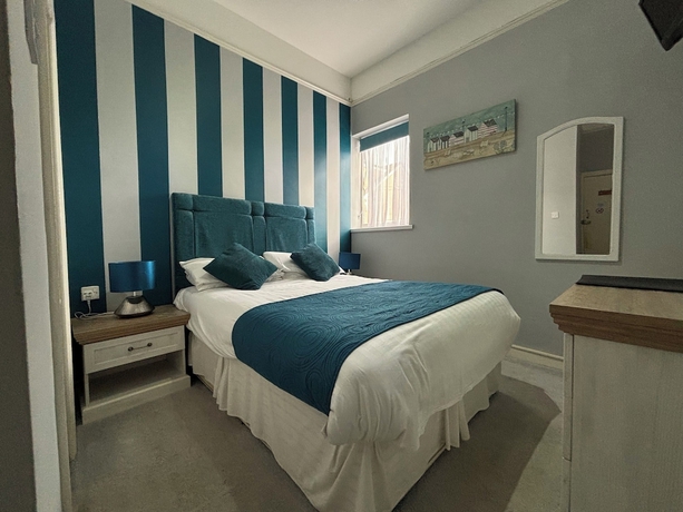 Imagen de la habitación del Hotel Three palms. Foto 2