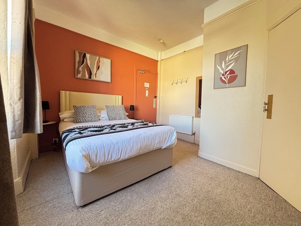Imagen de la habitación del Hotel Three palms. Foto 9