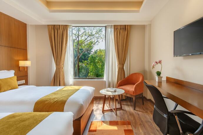Imagen de la habitación del Hotel Thrive, A Tropical Courtyard. Foto 18