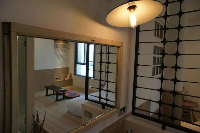 Imagen de la habitación del Hotel Through A Path. Foto 30