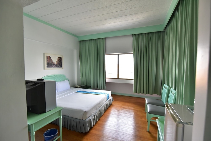 Imagen de la habitación del Hotel Thumrin. Foto 6