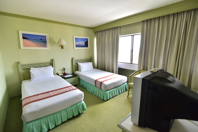 Imagen de la habitación del Hotel Thumrin. Foto 9