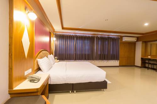 Imagen de la habitación del Hotel Thungtawan. Foto 7