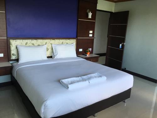 Imagen de la habitación del Hotel Thungtawan. Foto 9