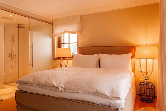 Imagen de la habitación del Hotel Thurnher's Alpenhof. Foto 11