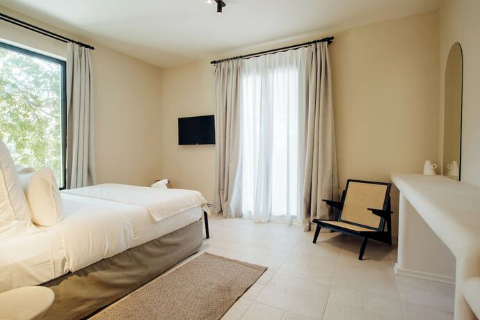 Imagen de la habitación del Hotel Thymises Boutique. Foto 17