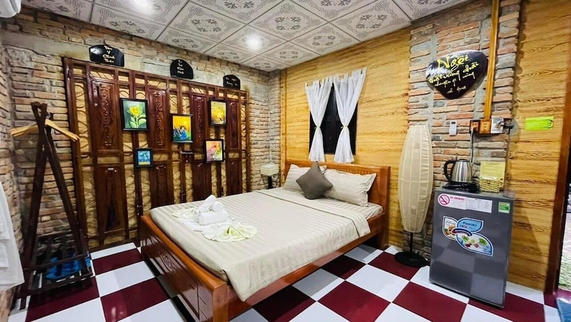 Imagen de la habitación del Hotel Ti Ni Homestay. Foto 2