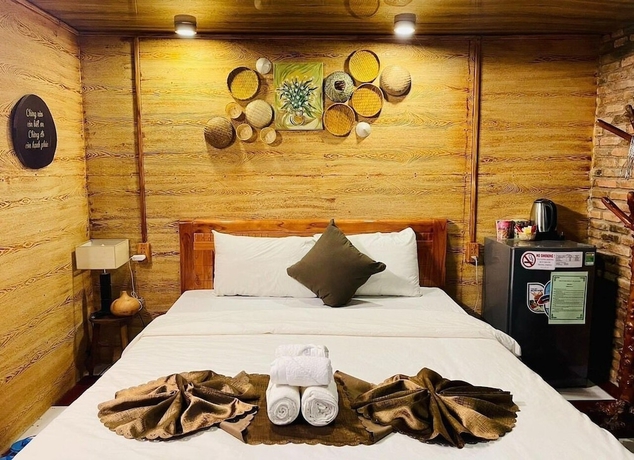 Imagen de la habitación del Hotel Ti Ni Homestay. Foto 7