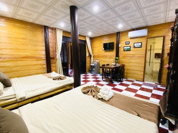 Imagen de la habitación del Hotel Ti Ni Homestay. Foto 8