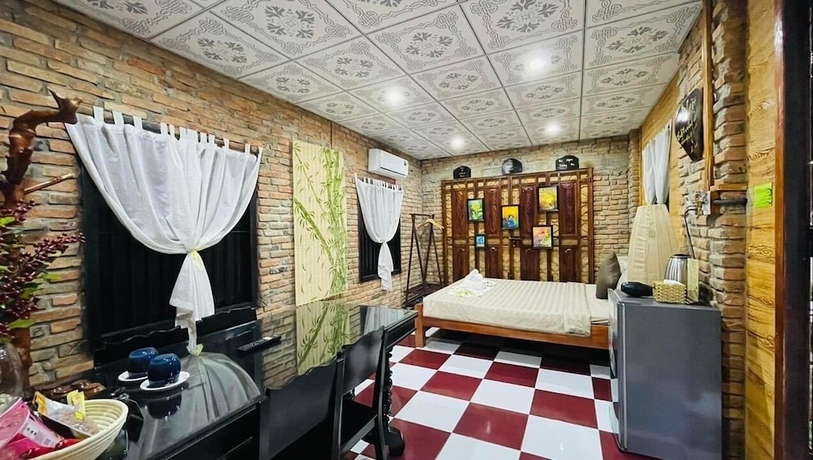 Imagen de la habitación del Hotel Ti Ni Homestay. Foto 11