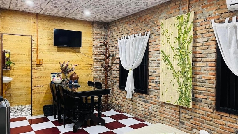 Imagen de la habitación del Hotel Ti Ni Homestay. Foto 12