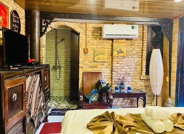 Imagen de la habitación del Hotel Ti Ni Homestay. Foto 15