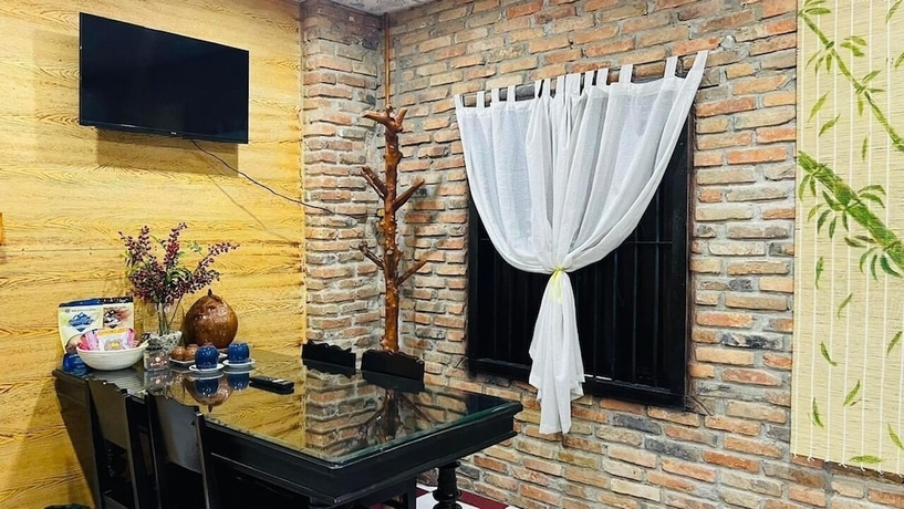 Imagen de la habitación del Hotel Ti Ni Homestay. Foto 16