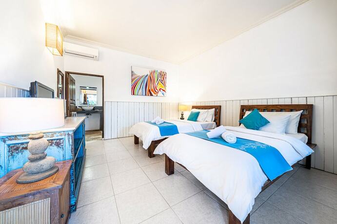 Imagen de la habitación del Hotel Tír na nÓg Beachfront Resort. Foto 12