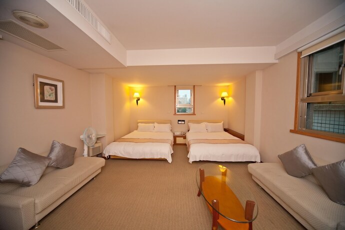 Imagen de la habitación del Hotel Tian Long. Foto 26