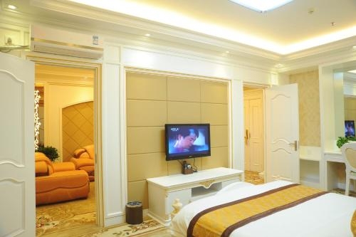 Imagen de la habitación del Hotel Tian Run International Dunhuang. Foto 8