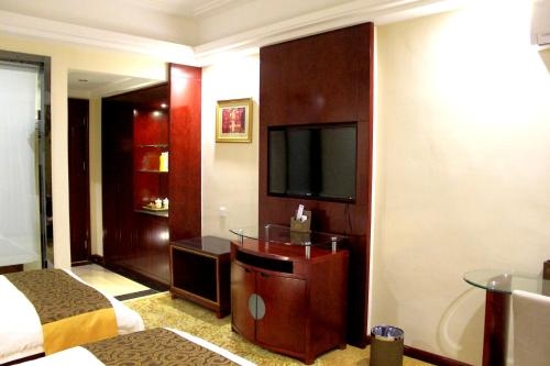 Imagen de la habitación del Hotel Tian Run International Dunhuang. Foto 9