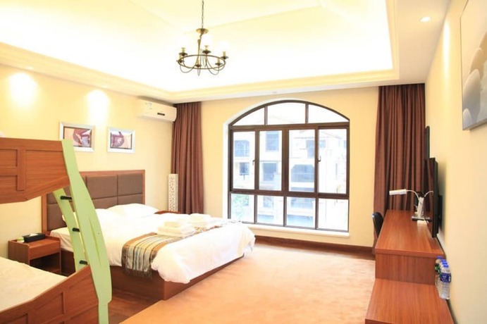 Imagen de la habitación del Hotel Tian Yue Hui Hot Spring Villa. Foto 9