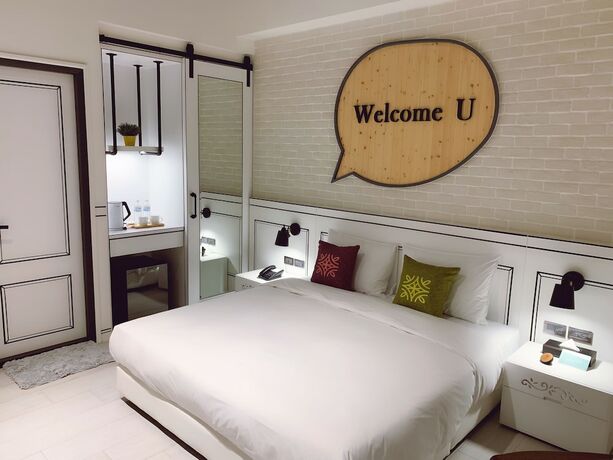 Imagen de la habitación del Hotel Tian Zhong. Foto 23