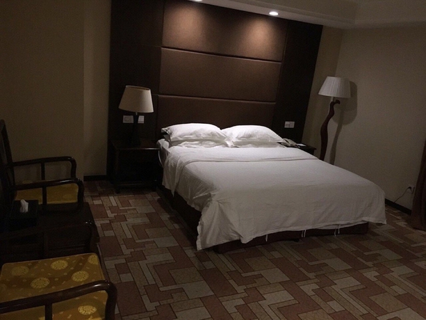 Imagen de la habitación del Hotel Tianan Rega. Foto 11