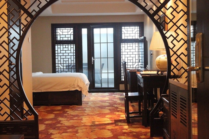 Imagen de la habitación del Hotel Tianan Rega. Foto 16