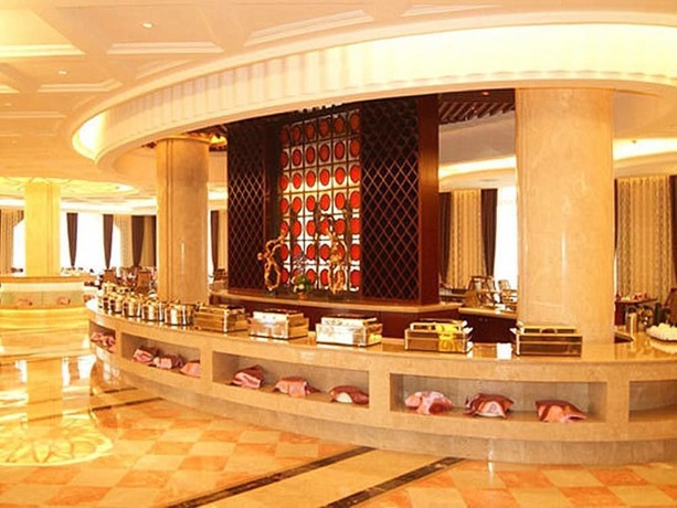 Imagen del bar/restaurante del Hotel Tianbao Garden Hotel. Foto 4
