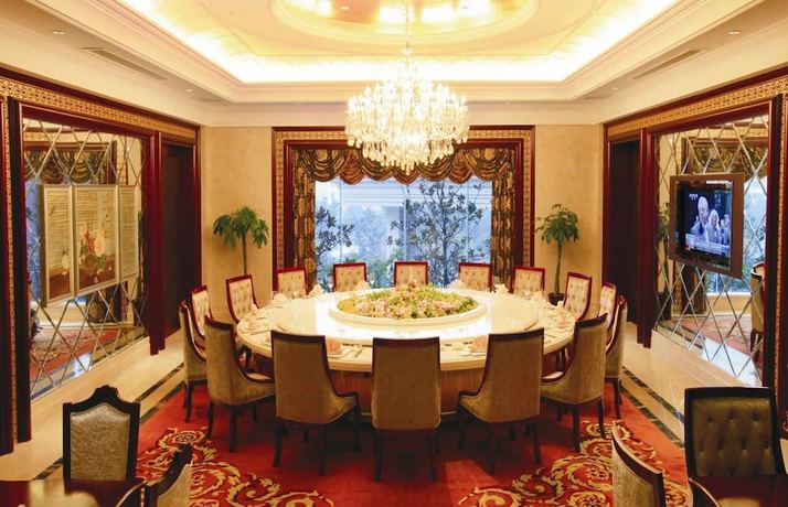 Imagen del bar/restaurante del Hotel Tianbao Garden Hotel. Foto 5