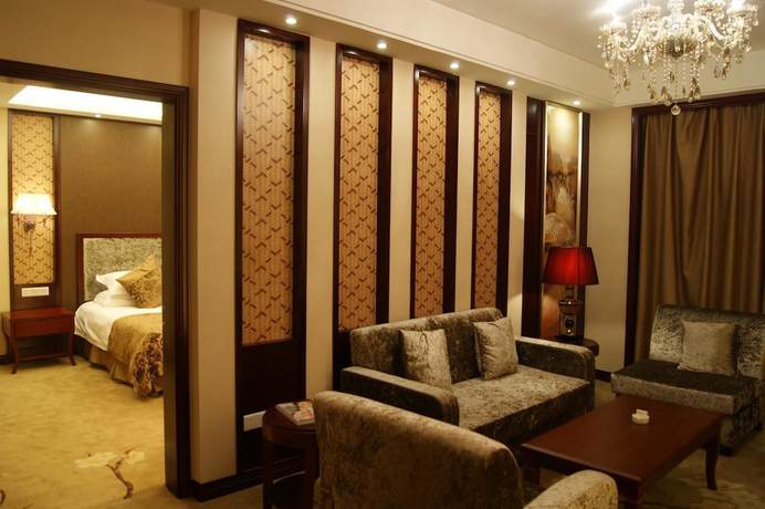 Imagen de la habitación del Hotel Tianbao Garden Hotel. Foto 8