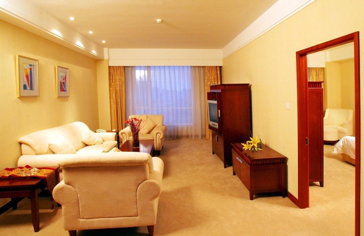 Imagen de la habitación del Hotel Tianbao International. Foto 3