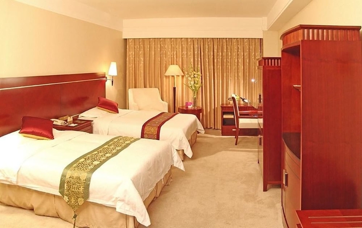 Imagen de la habitación del Hotel Tianbao International. Foto 4