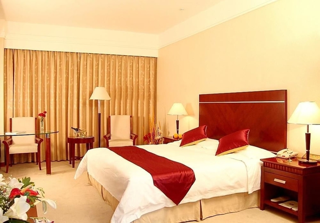 Imagen de la habitación del Hotel Tianbao International. Foto 7