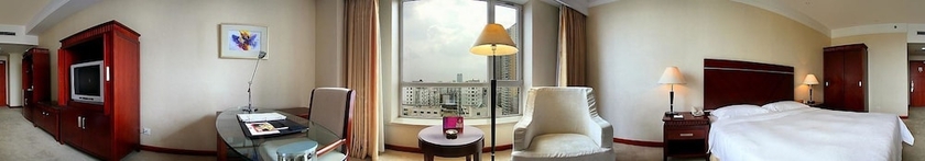 Imagen de la habitación del Hotel Tianbao International. Foto 9