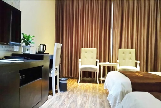 Imagen de la habitación del Hotel Tianchang Holiday Hotel. Foto 4