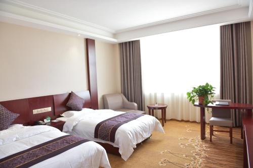 Imagen de la habitación del Hotel Tianhewan Dunhuang. Foto 8