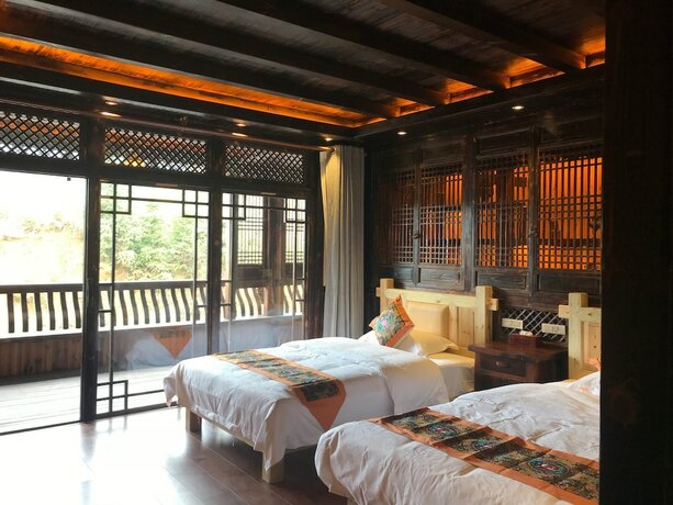 Imagen de la habitación del Hotel Tianjiange Resort. Foto 16