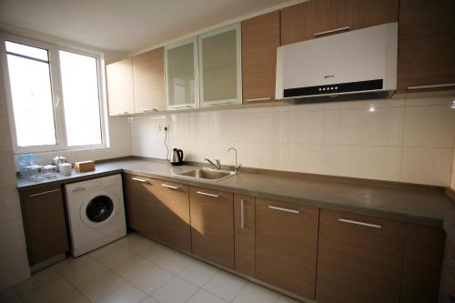 Imagen de la habitación del Hotel Tianjin All-legend International. Foto 4