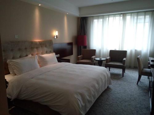 Imagen de la habitación del Hotel Tianjin All-legend International. Foto 5