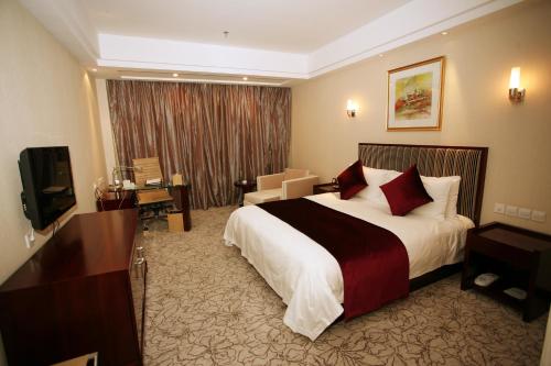 Imagen de la habitación del Hotel Tianjin All-legend International. Foto 7