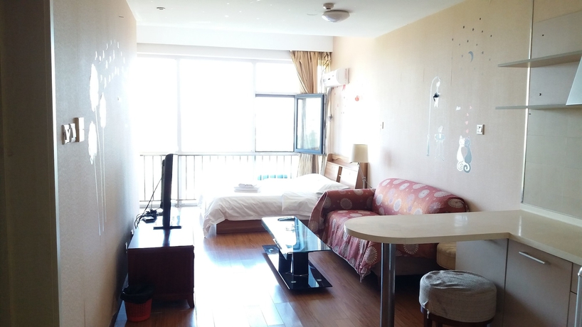 Imagen de la habitación del Hotel Tianjin Chaoju Apartment. Foto 10