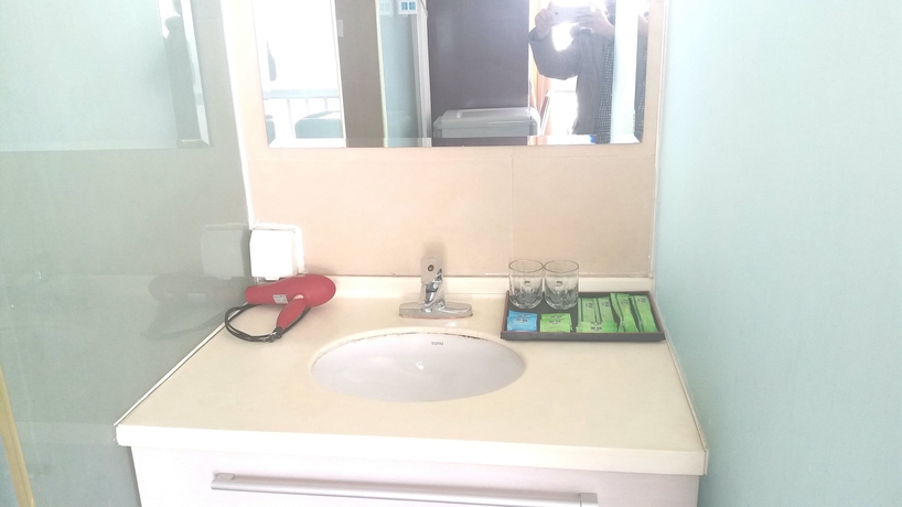 Imagen de la habitación del Hotel Tianjin Chaoju Apartment. Foto 14